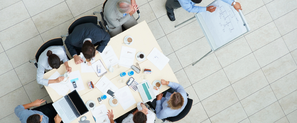 Picture of top down view of people at a table