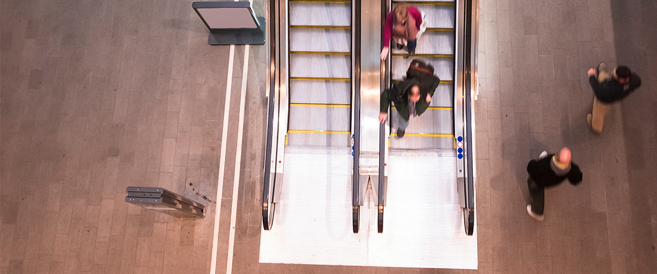 Picture of people on escalator