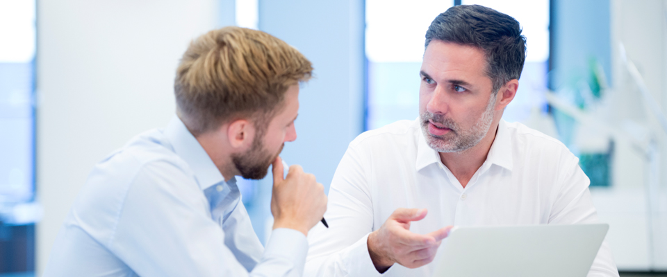 Picture of two men talking