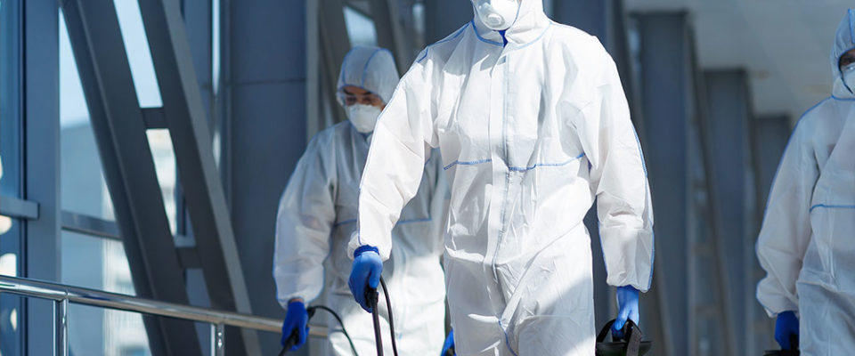 People in chemical safety suit